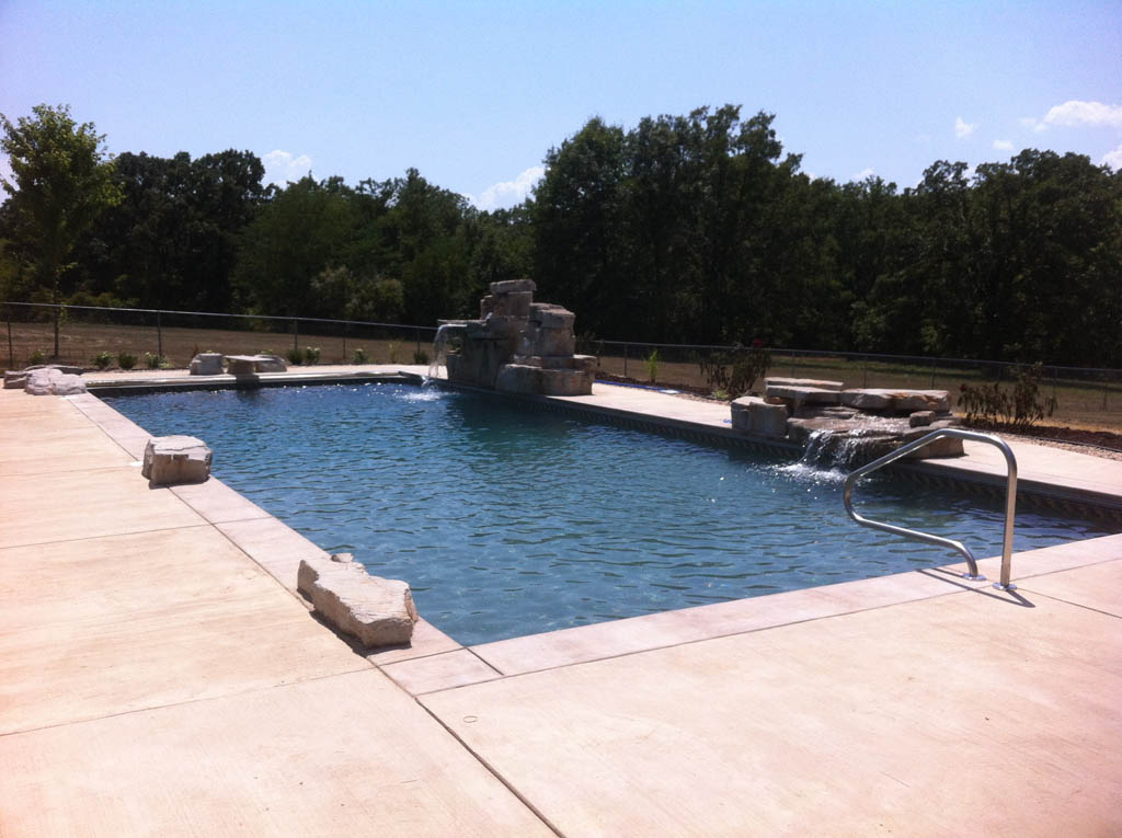 rectangle pool with two fountains and diving board - JNR Pools