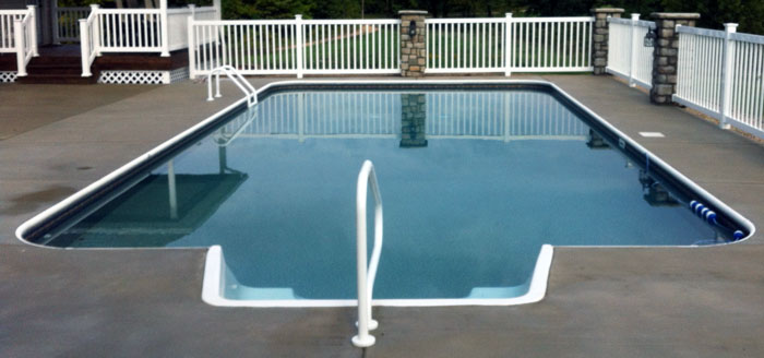 rectangle pool with white fence - JNR Pools